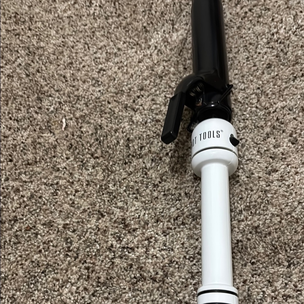 Authentic Hot Tools Black and White Curling tool.
